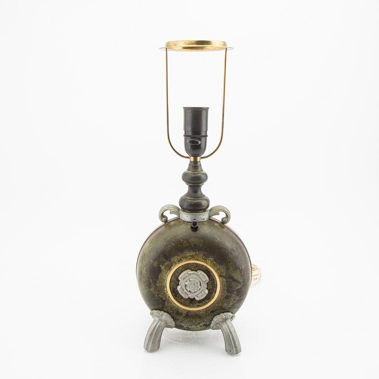A 1940s metal table lamp.