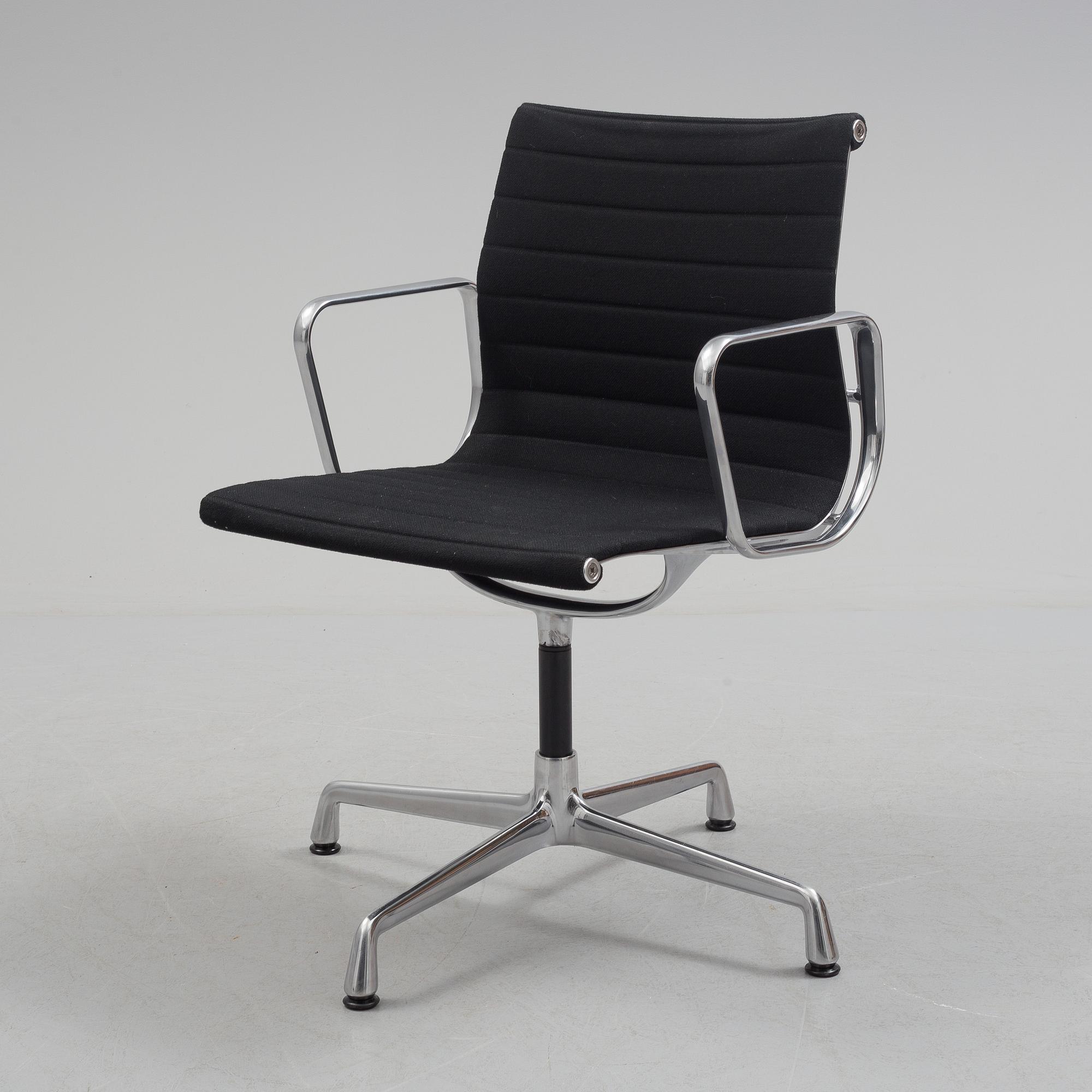 A 'EA 104 Swivel' armchair by Charles & Ray Eames, Vitra, 2016.