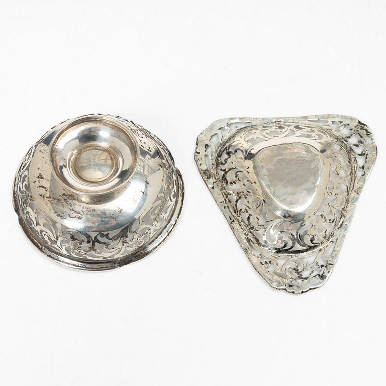 Two pierced silver bowls and two sugar spoons, including Sweden and Endland, 20th century.