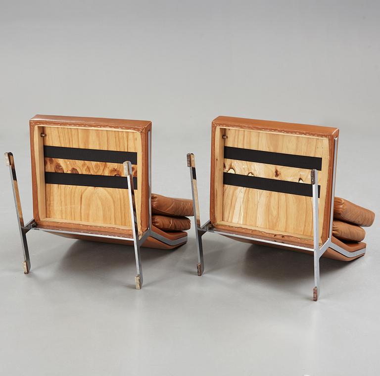 A pair of Poul Nørreklit chromed steel and brown leather easy chairs, Selectform, Denmark 1960's.