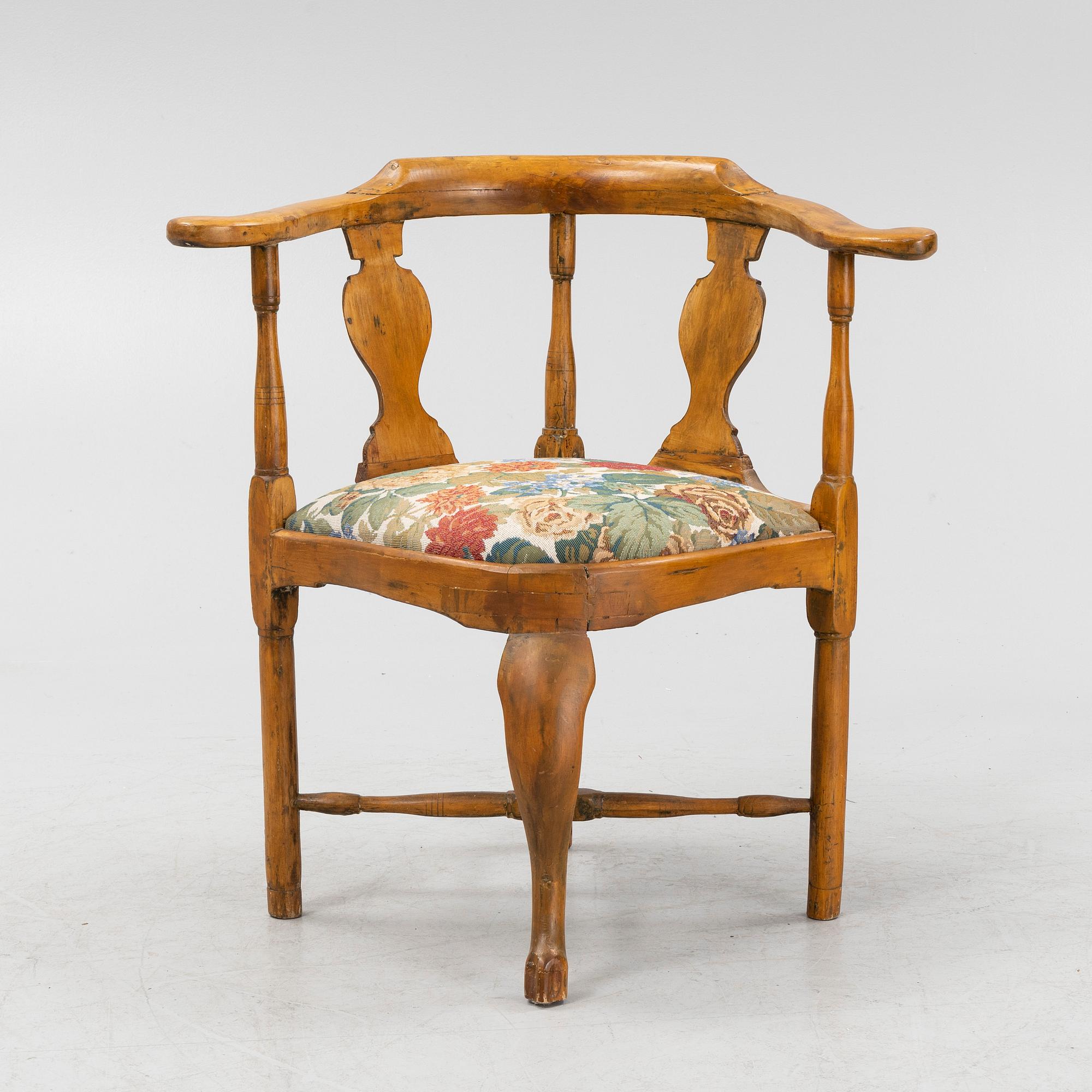A Rococo armchair, mid 18th century.