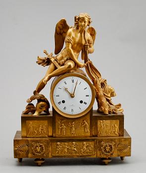 793. A French Empire early 19th century gilt bronze mantel clock.