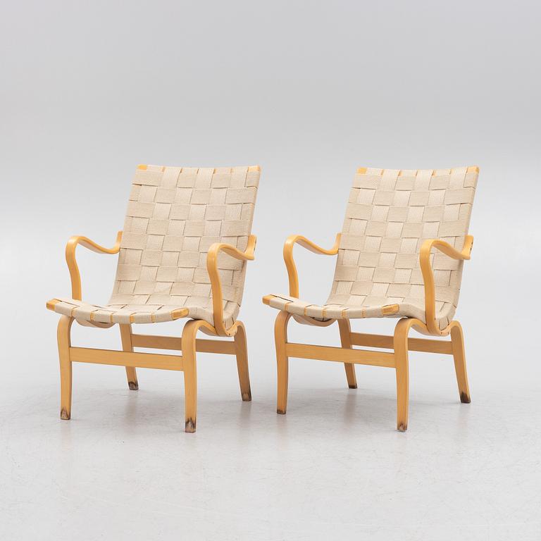 Bruno Mathsson, a pir of 'Eva' armchairs, Dux, late 20th century.