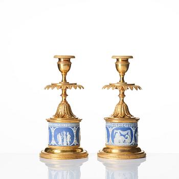 A pair of George III ormolu and jasperware candlesticks, late 18th century.