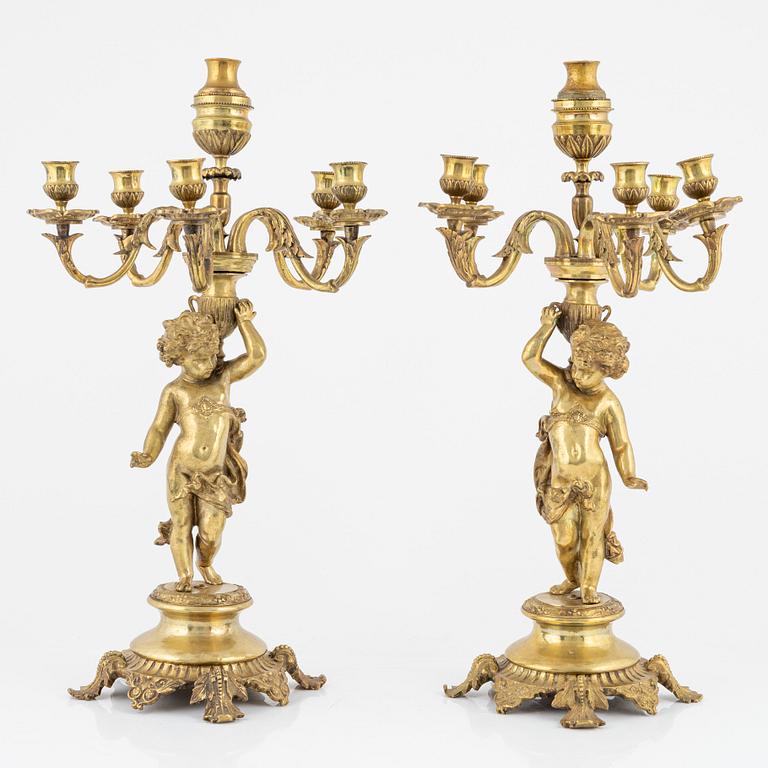 A pair of brass candelabra, second half of the 19th Century.