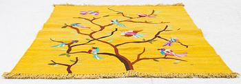 A hand-embroidered Kelim rug, c. 178 x 122 cm.