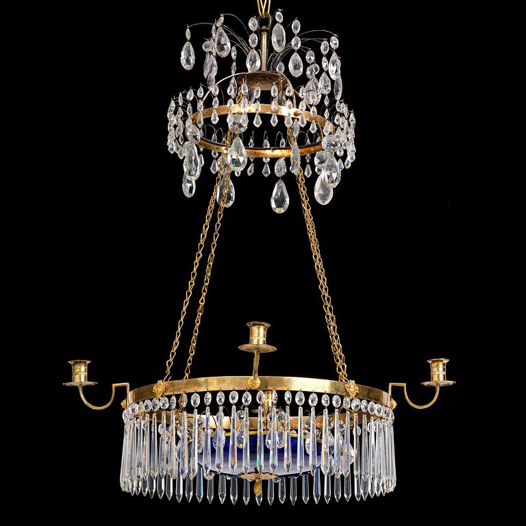 A late Gustavian five-light gilt brass and cut glass chandelier, Stockholm, late 18th century.