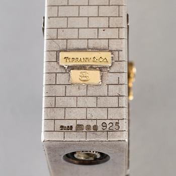 A Tiffany & Co. silver cigarette-lighter, marked London 1970.