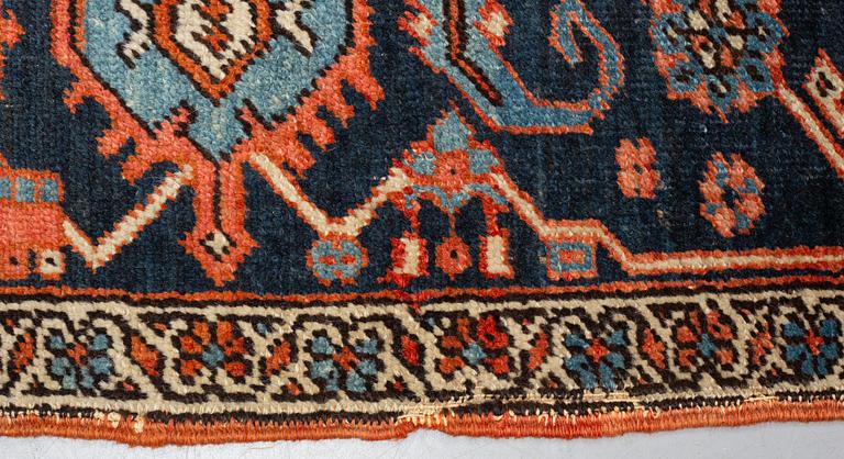 A carpet, an antique Heriz, ca 469,5-471 x 300-309,5 cm.