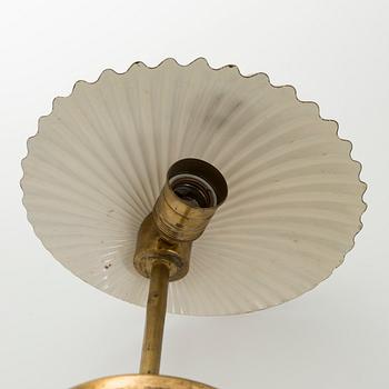 Paavo Tynell, a 1940s '5321' 'The Shell' table lamp for Taito.