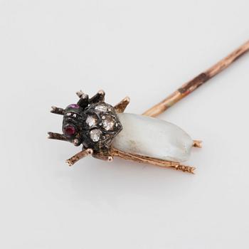 A Russian pin in the shape of an insect set with a baroque pearl, rose-cut diamonds and rubies.