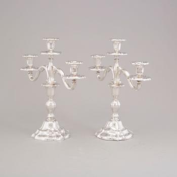 A Pair of silver candelabras by JG Hentzell 1931.