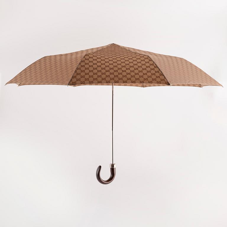 Gucci, an umbrella.