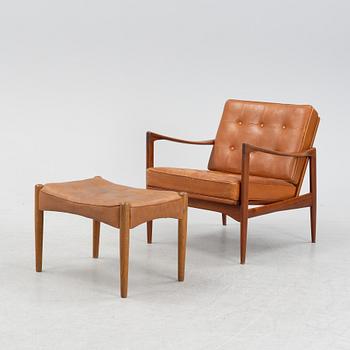 A 1960's 'Kandidaten' easy chair by Ib Kofod Larsen for OPE with additional, not original, stool.