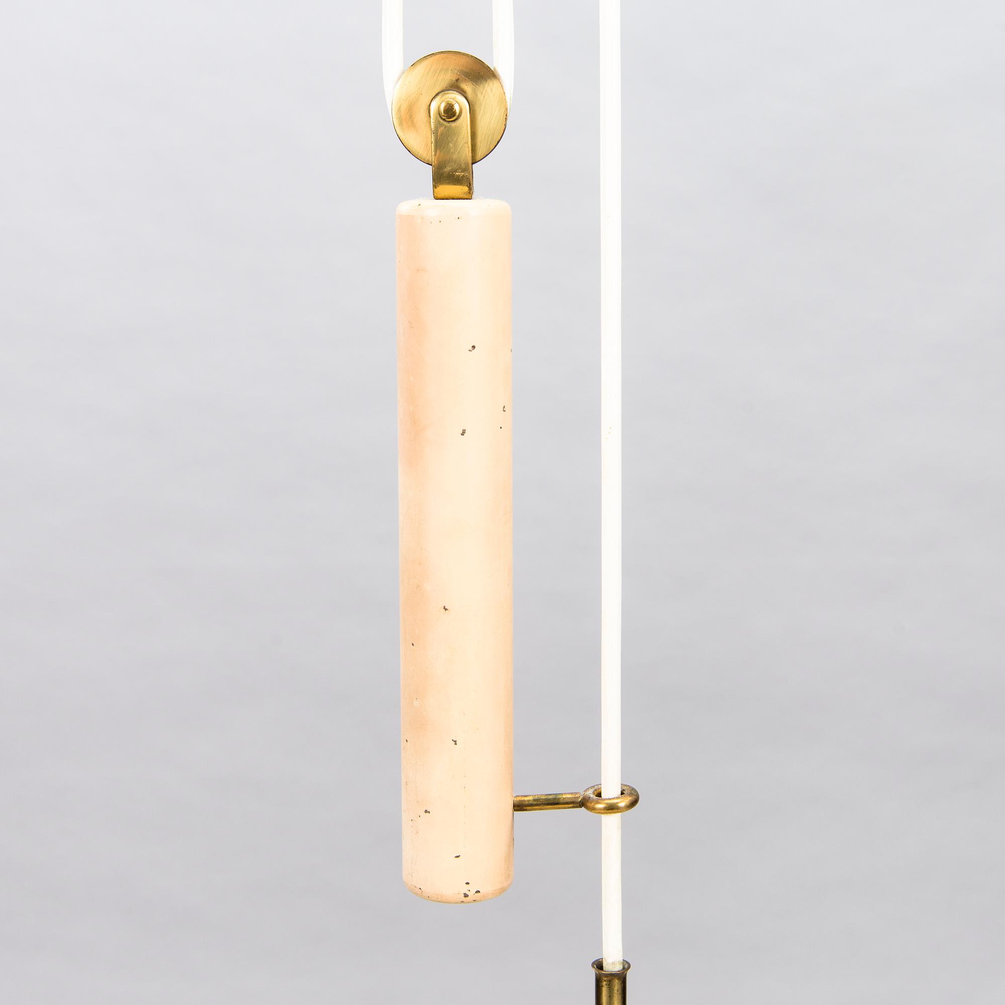 A mid-20th Century ceiling light, model A1998, for Taito Finland.
