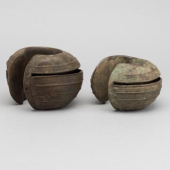 Two bronze currency braclets, Baule, Ivory Coast.