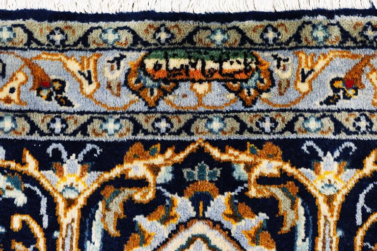 A Kashan carpet, c. 343 x 236 cm.