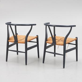 Hans J. Wegner, a set of four model 'CH-24' chairs, Carl Hansen & Søn, Denmark.