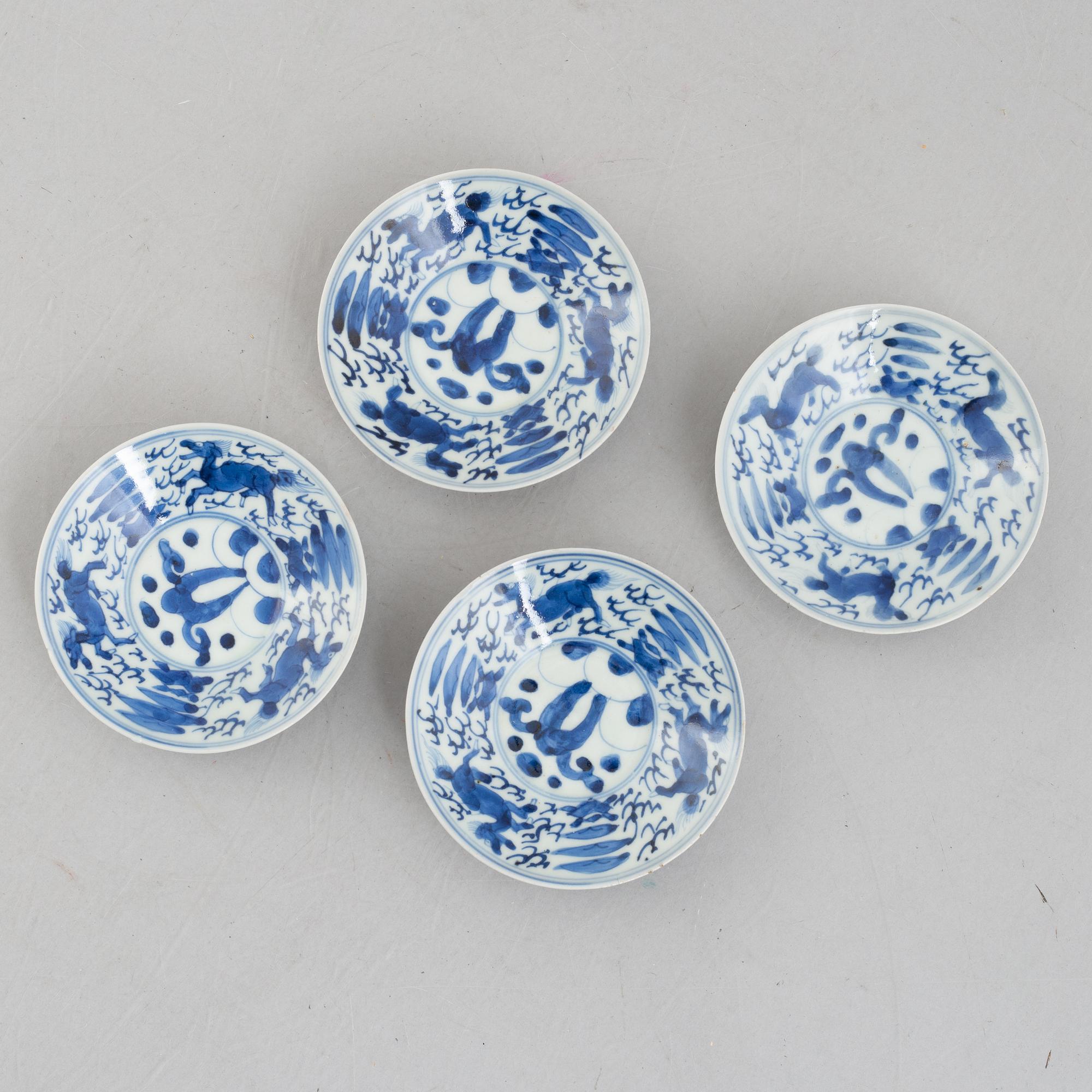 A set of four blue and white Chinese porcelain dishes, 19th century.
