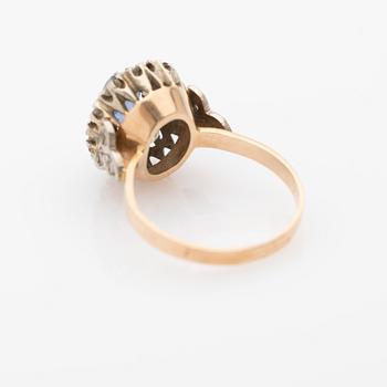 Ring, 18k gold with diamonds and sapphire.