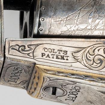 A percussion revolver, Colt 1851 Navy, in case, from the year 1863.