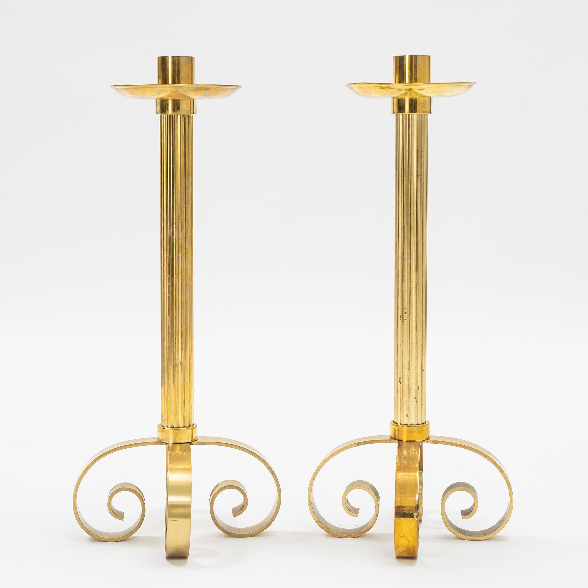 Ivar Ålenius-Björk, a pair of brass candle holders, Ystad Metall.