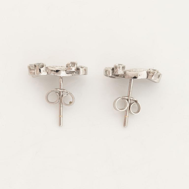 Diamond leaf earrings.