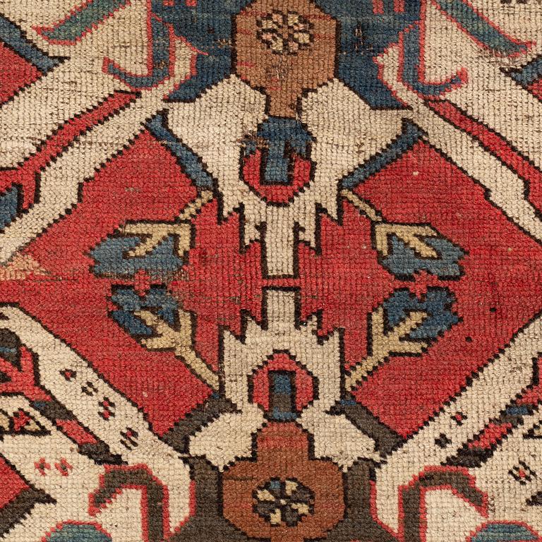 A rug, Antique so called "Sunburst Karabagh" or "Eagle Kazak", ca 174 x 138 cm.