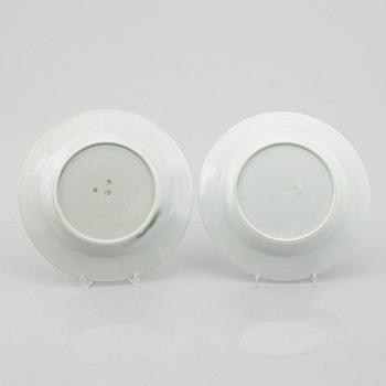 A group of nine porcelain armorial plates, probablu Samson, 19th/20th century.