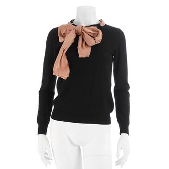 540. LOUIS VUITTON, a black woolblend sweater with ribbon neckline dekor, size 2.