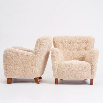 Fritz Hansen, a pair of easy chairs model '1669', Denmark 1940-50s.