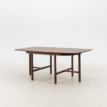A table and four chairs in lacquered mahogany by David Rosén, "Triva-diné", middle of the 20th century.