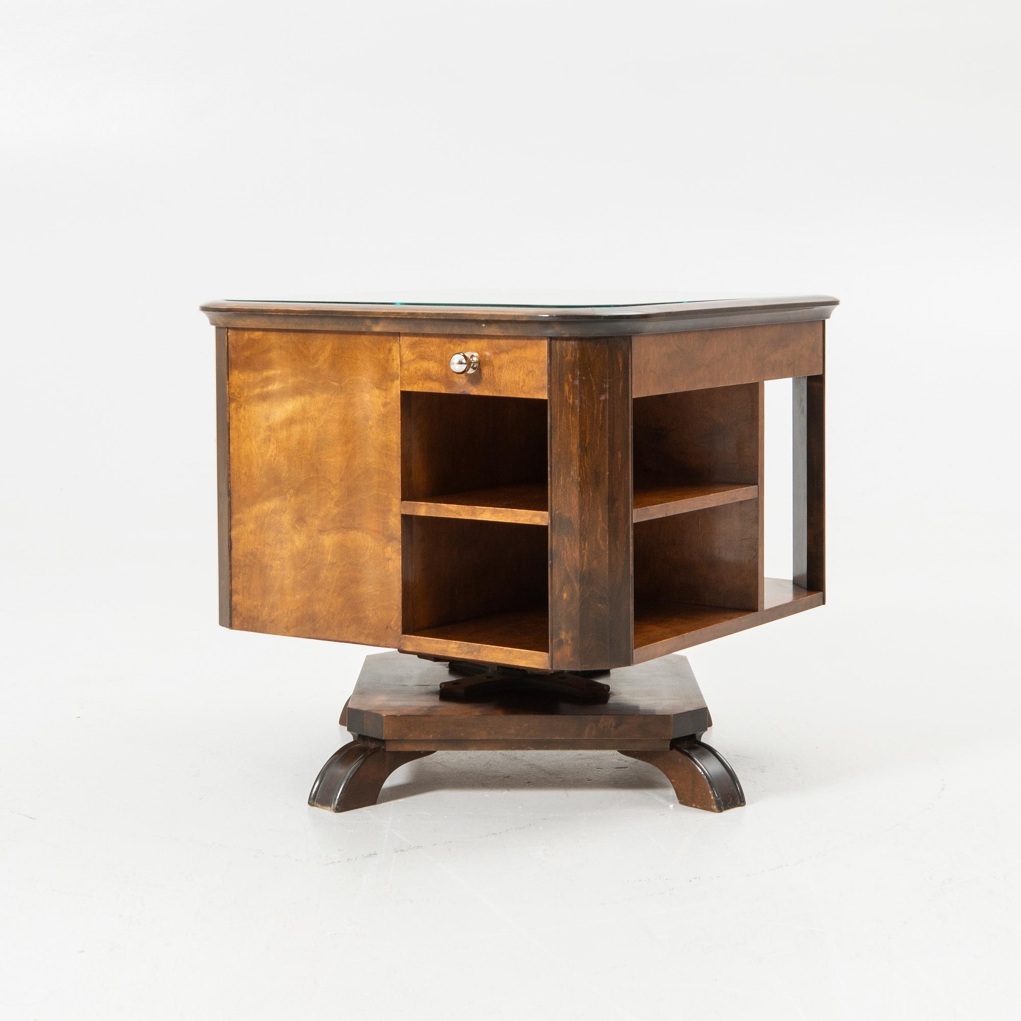 Rotating table with fitted bar, 1930s/40s.