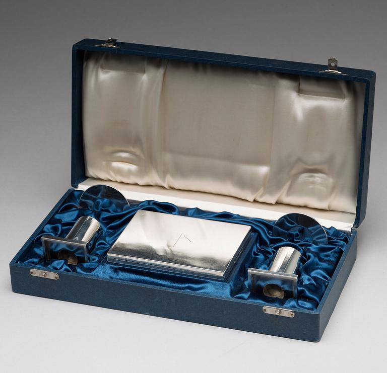 Wiwen Nilsson, a silver set with a pair of candlesticks and a cigarette case, Lund Sweden 1927-38.