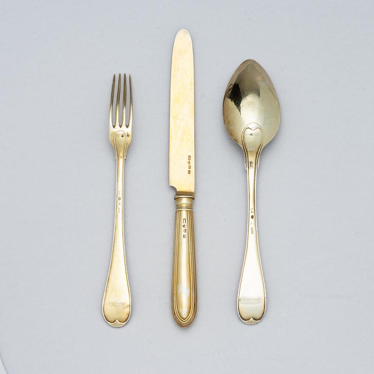 A Swedish 19th / 20th century 36 piece silver-gilt dessert-cutlery, mark of JP Grönvall, Stockholm 1818-1821 and.