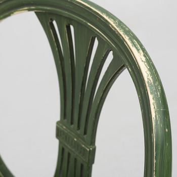 A Gustavian dining table with 8 chairs, Åmells, second half of the 20th century.