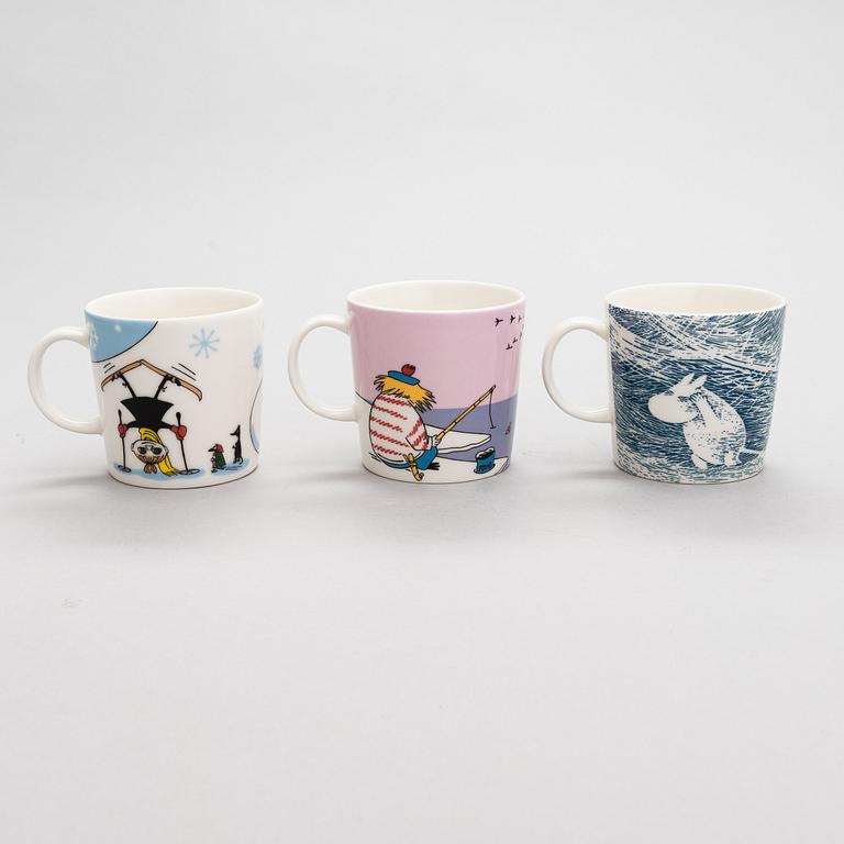 A set of seven winter theme Moomin mugs, vitro porcelain, Moomin Characters, Arabia.