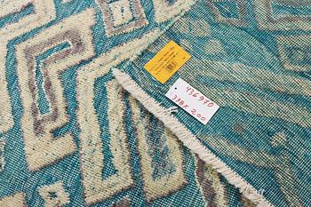 A Moroccan carpet, c. 398 x 200 cm.