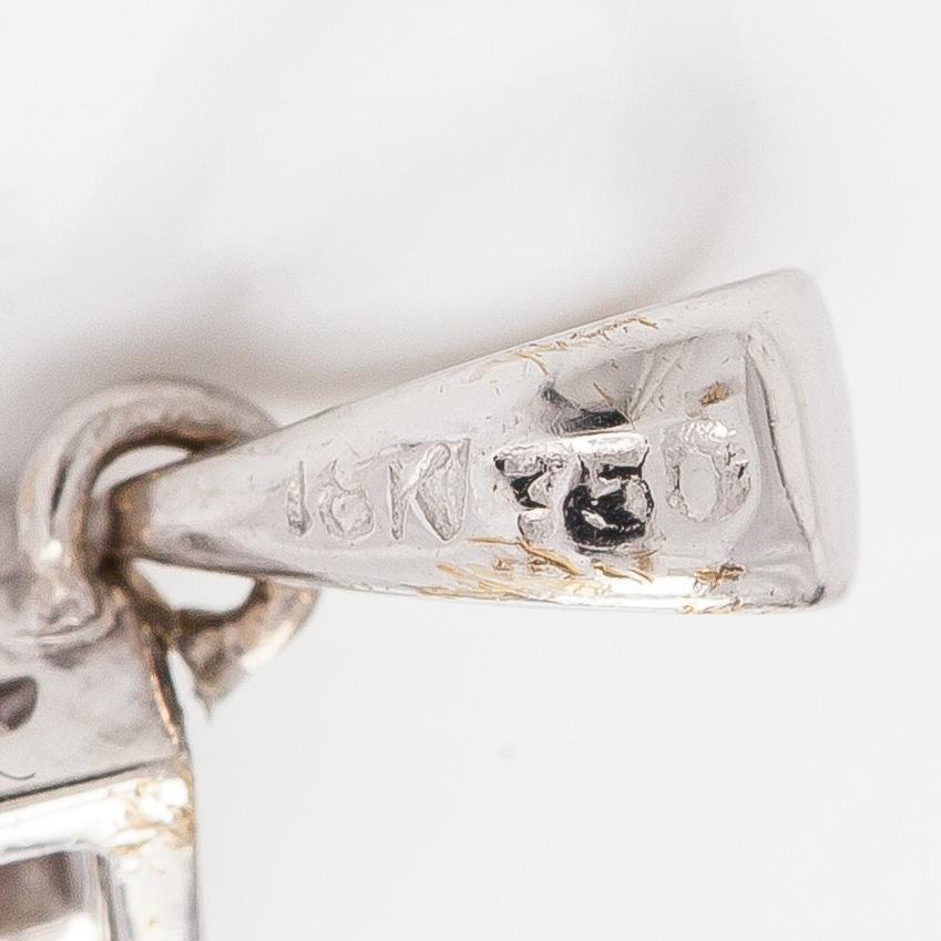Pendant, princess-cut diamonds, 18K white gold.