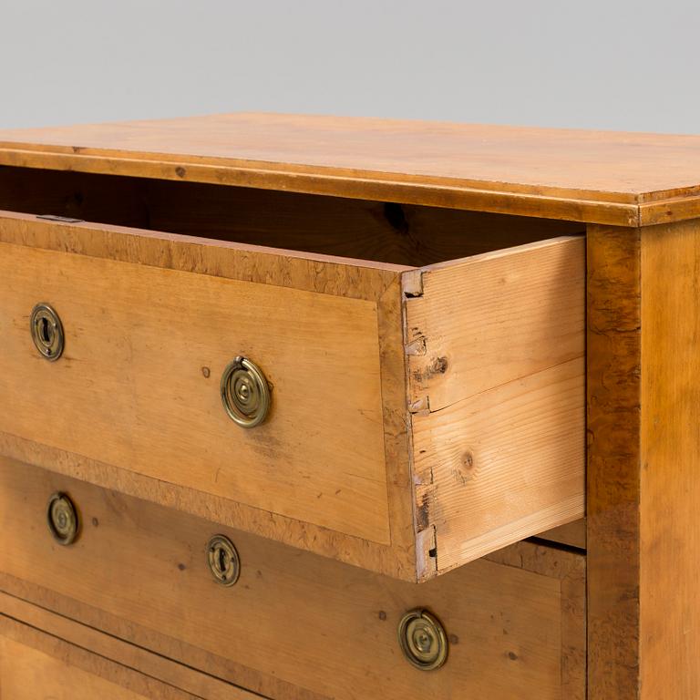 a chest of drawers from the 19th century.