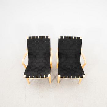 Bruno Mathsson,  pair of Eva easy chairs later part of the 20th century.