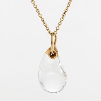 Tiffany & Co, Elsa Peretti, an 18K gold "Teardrop" necklace with a rock crystal pendant.