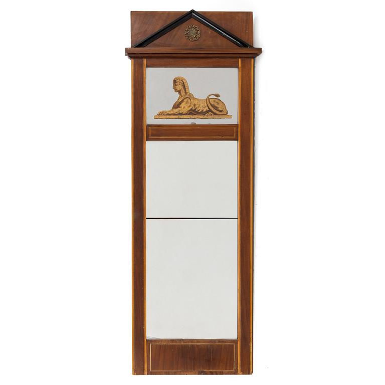 An Empire style mirror, second half of the 20th century.