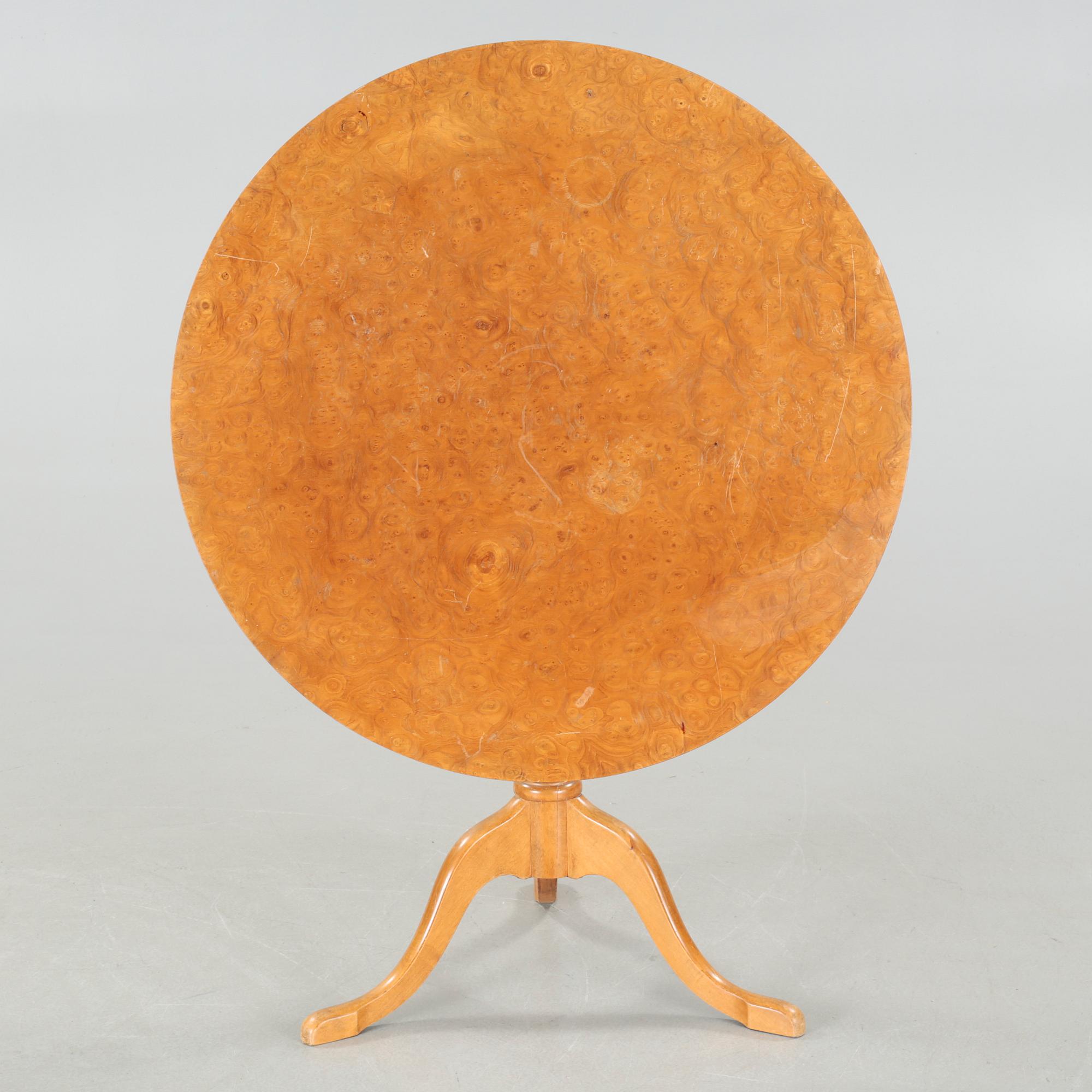 A folding table, made in the first half of the 20th century.