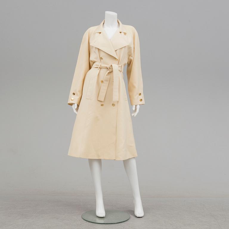 A trench-coat by Guy Laroche.
