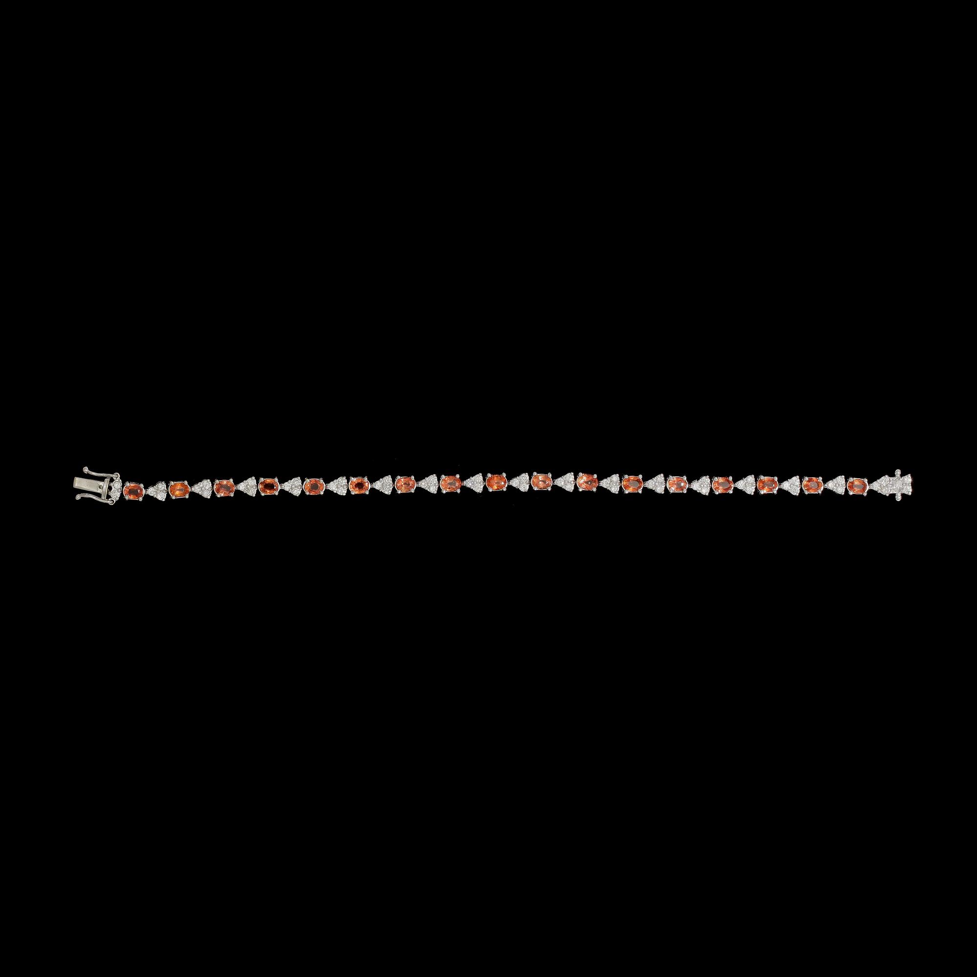 ARMBAND, briljantslipade diamanter, tot. ca 1.40 ct samt orangea safirer, tot. ca 6 ct.