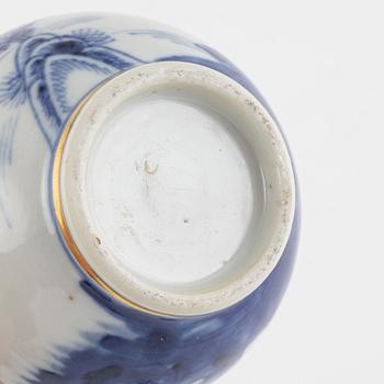 A small Chinese export tureen with cover, two cups, a saucer and a jug with cover, Qing dynasty, 18th century.