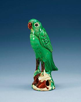 A green glazed falcon, Qing dynasty.