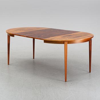 A rosewood dining table, 1970's.