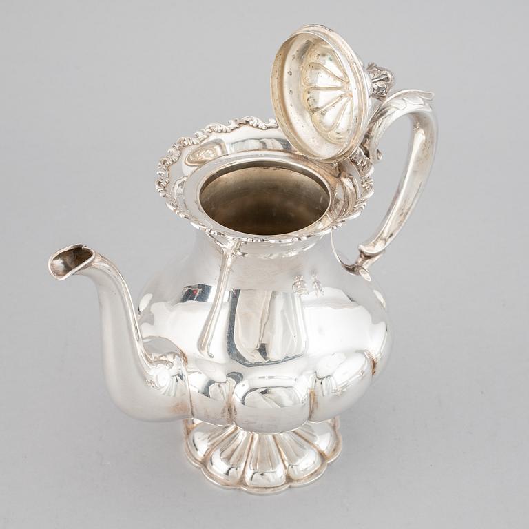 A finnish silver coffee pot, creamer and sugar bowl. Turku 1979.